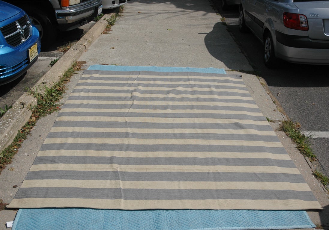 Handwoven flatweave carpet with alternating stripes