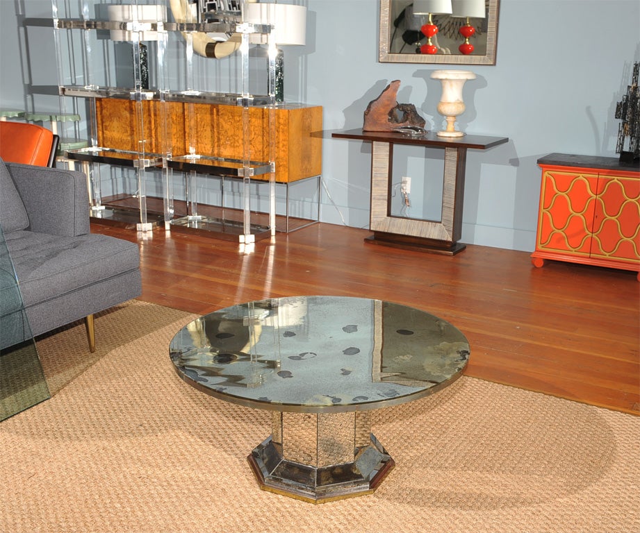 Beautiful mirrored coffee table completely restored. Matching tall chest of drawers and pair of parsons tables available.