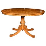 A very fine English antique center table in satinwood