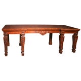 An important English antique serving table in mahogany.