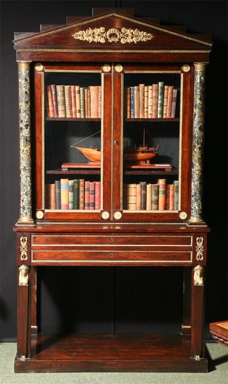 An English Regency bookcase in faux Rosewood