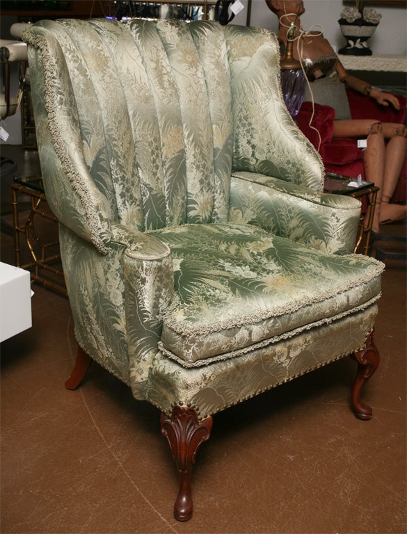 Wonderful 1930's wingback chair with the original vintage fabric. Marvelous condition and very comfortable.