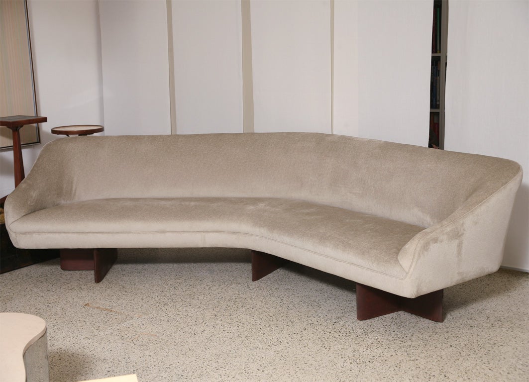 Vladimir Kagan Wide-Angle sofa <br />
with sloping armrests with walnut legs<br />
reupholstered in Knoll Fabric