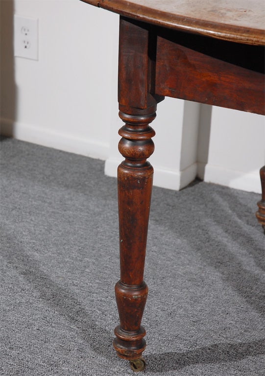 Walnut 19THC WALNUT DROP LEAF TABLE W/ORIGINA BRASS CASTER