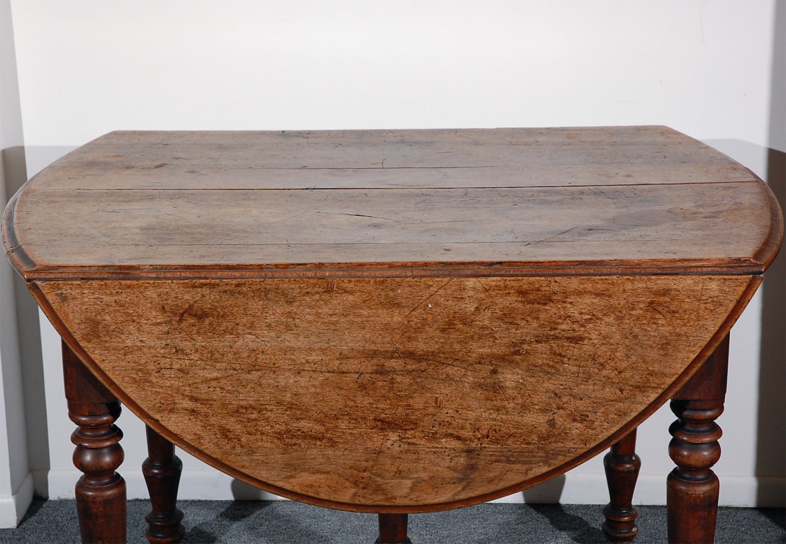 19THC WALNUT DROP LEAF TABLE W/ORIGINA BRASS CASTER 4