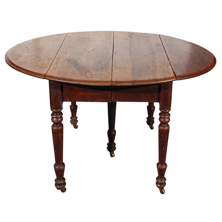 19THC WALNUT DROP LEAF TABLE W/ORIGINA BRASS CASTER