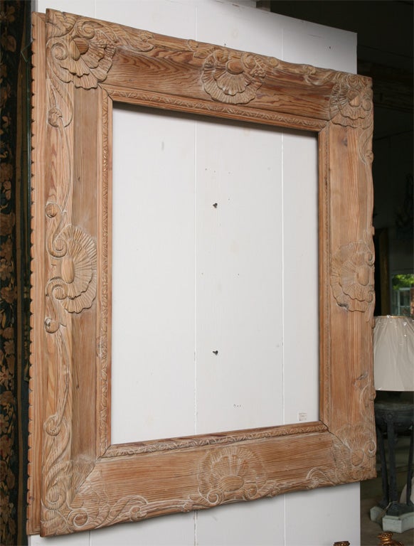 Carved frame with shell motif