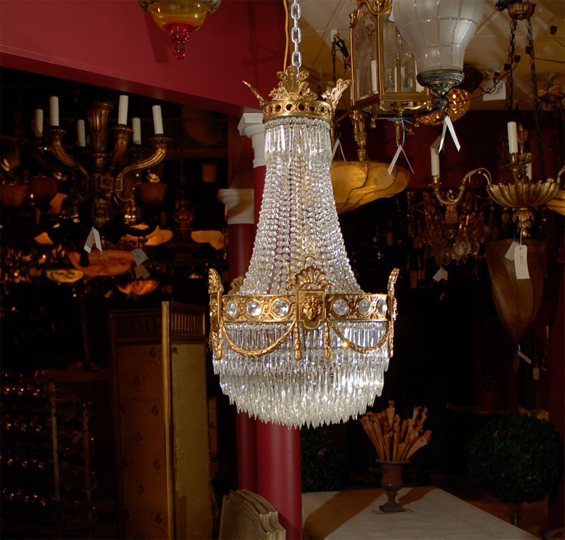Very fine gilt bronze and crystal basket style chandelier by Baccarat.
