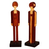 Pair of wooden "Little Dolls" by Pamela Weir-Quiton