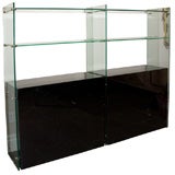 Stunning Two Sided Black Lacquer Etagere with Glass Shelves.