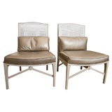 Pair Moderne glam chairs in leather and cane