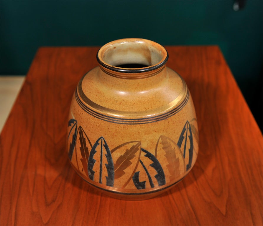 Ceramic vase decorated with leaves by Jean Luce, French 1925. It was displayed at the Pair 1925 Exposition, one of a few.

8 1/2 