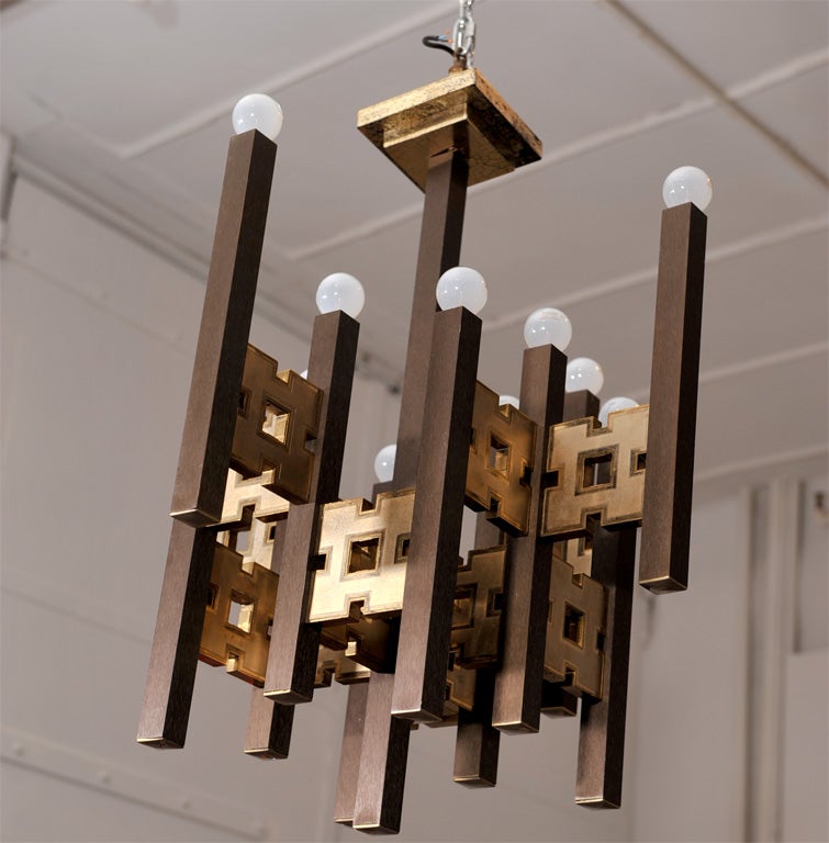 Ten bulbs shine on this beautifully stylized light by the Italian designer.