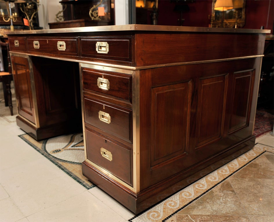 Mahogany Leather Top Campaign form three part partners desk with brass trim and hardware.  Hobbs & Co., London