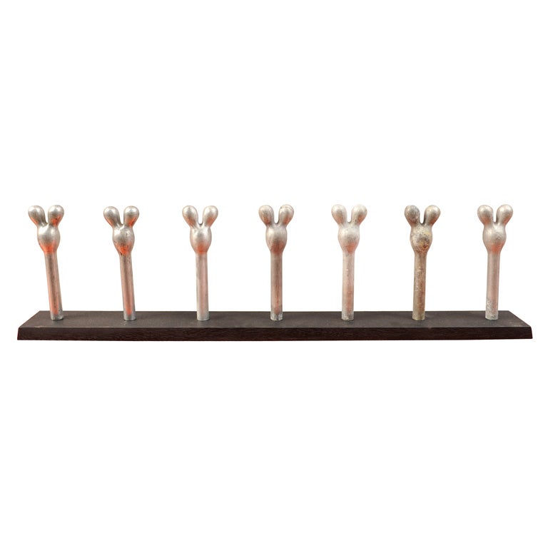 Aluminum Micky Mouse Mold on Wooden Rack