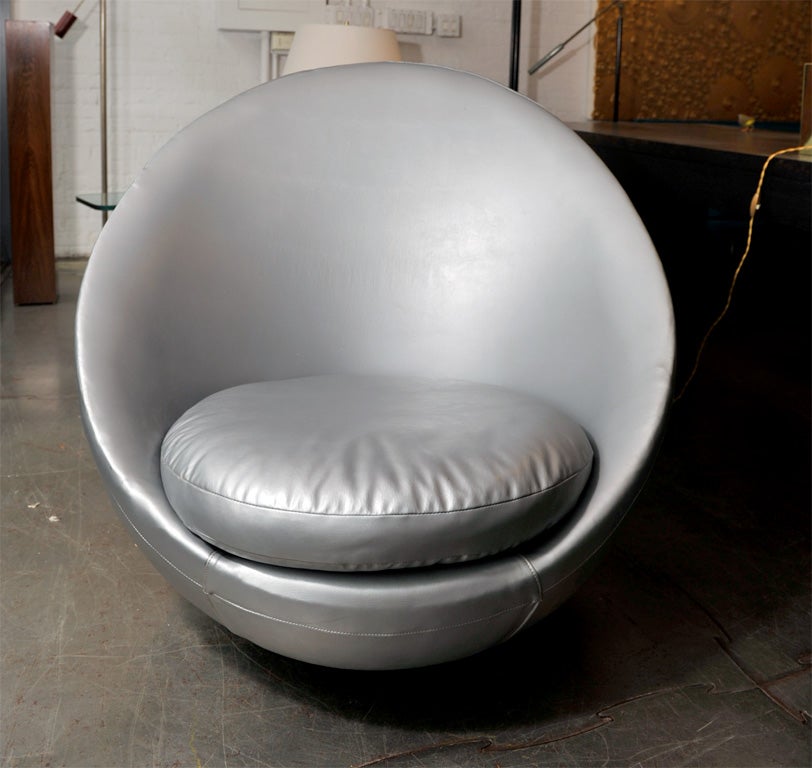 Rare pair of space age swivel chairs for Thayer-Coggin with all original metallic silver upholstery. Signed.