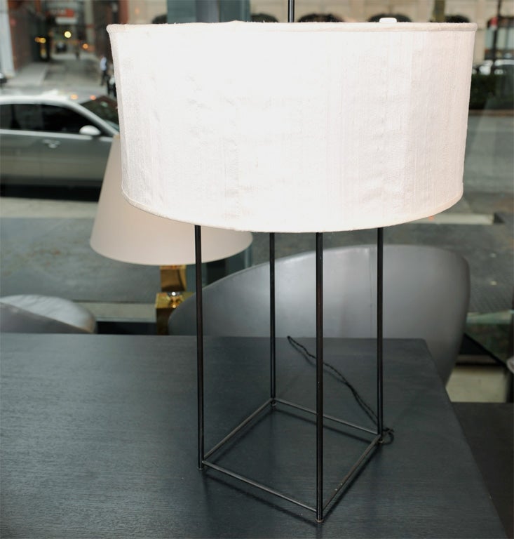 Rare painted iron table lamp designed for Parzinger Originals. Custom paper shade.