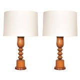 Pair of carved walnut lamps