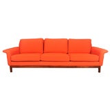 Orange 1960's Dux sofa, reupholstered in Knoll fabric
