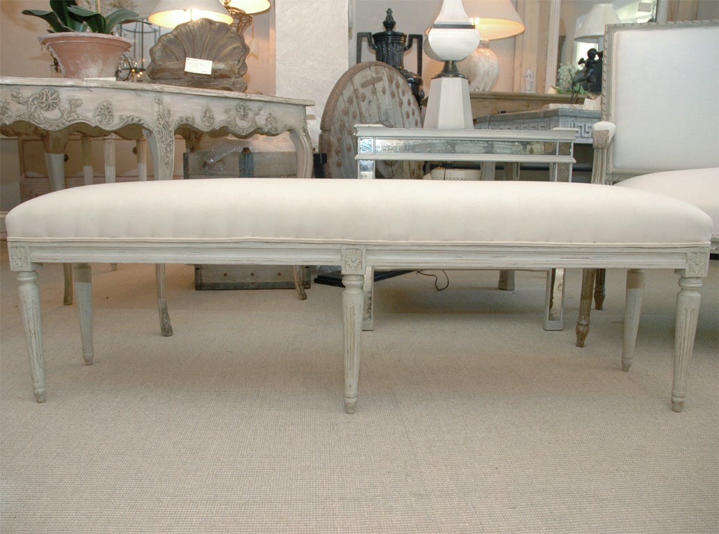 Nicely constructed Gustavian style end of bed bench covered in muslin