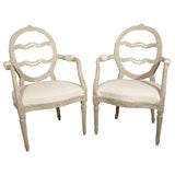 pair of gustavian smiling arm chairs