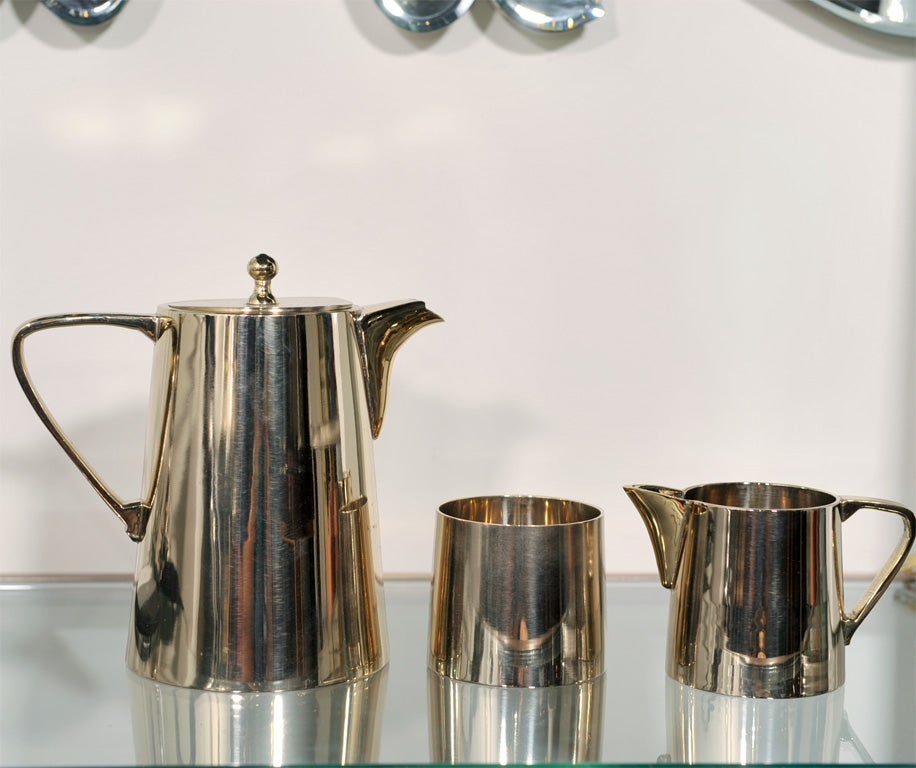 Three-piece coffee or tea service set, these rare pieces are vintage of late Art Deco, modernist design.