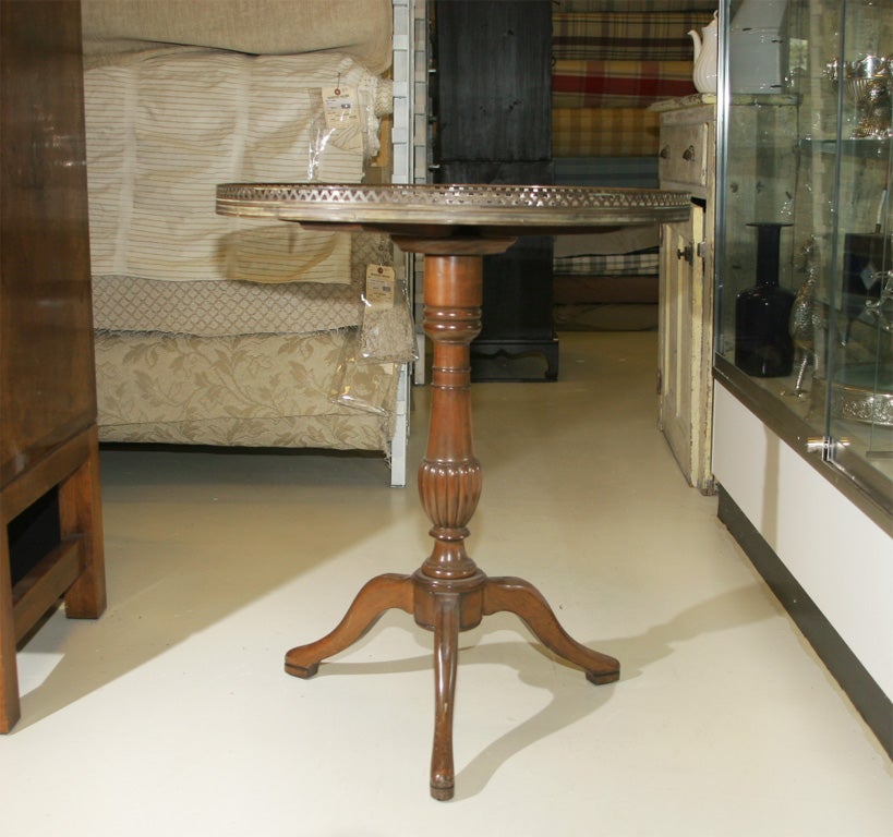 ROUND GALLERIED MARBLE TOP TABLE