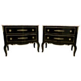 A Pair of Marble Top Black Laquered Commodes