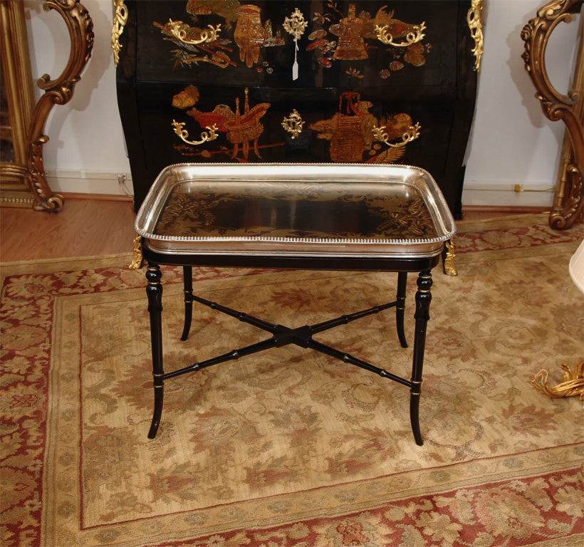 English Regency tray table on stand. Hand stenciled leaf design with a gadrooned Silver border.