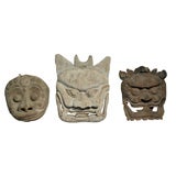 Antique Set of tribal masks from Southern China.