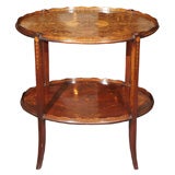 Antique English mahogany two tiered table. Inlaid.