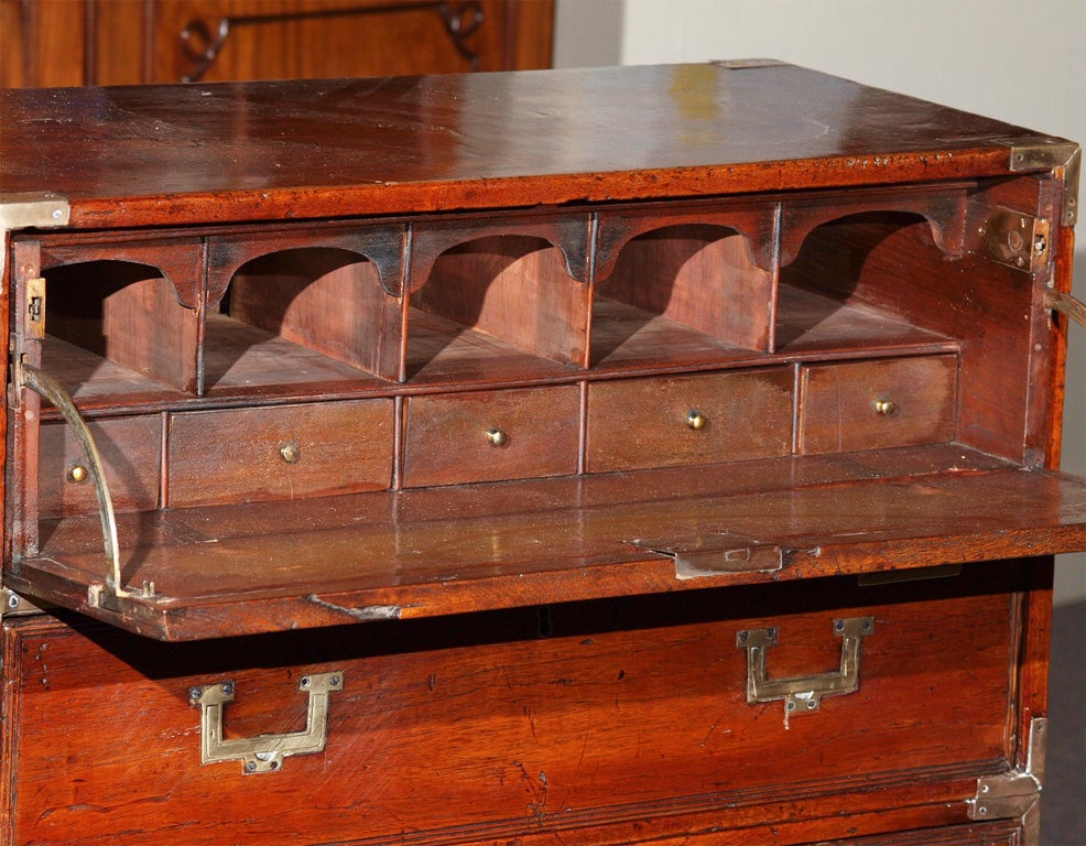 Antique English campaign chest. Teakwood and brass bound.