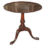 Antique English George III mahogany pie crust table.