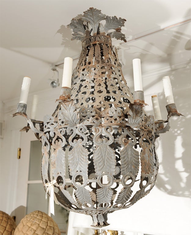 Exceptional and rare set of three Spanish zinc chandeliers <br />
from Barcelona. Individually priced below.