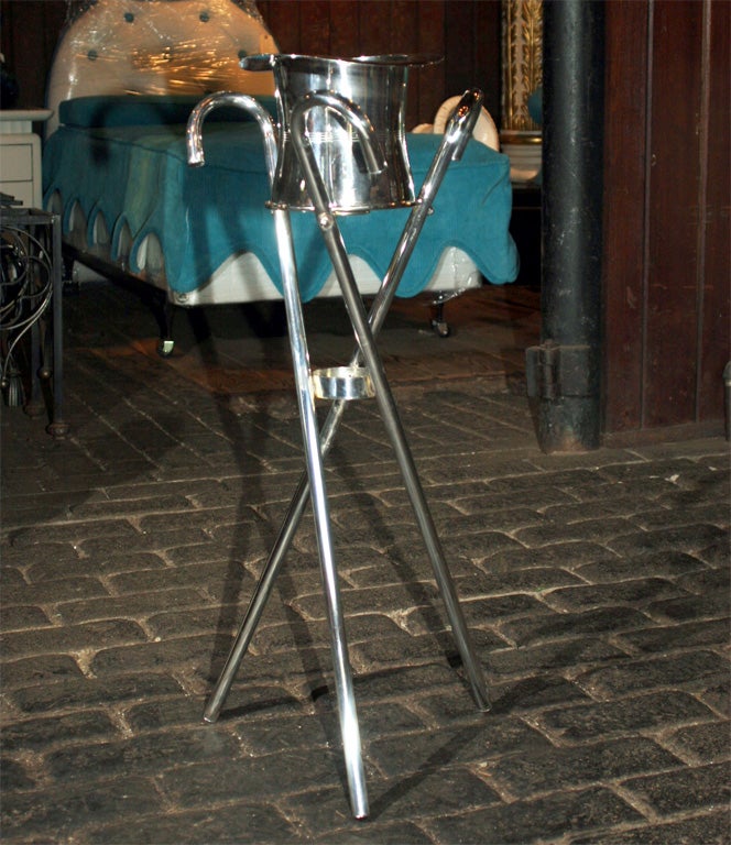 Charming champagne bucket and stand in the form of a top hat and three cane. Hat is 7