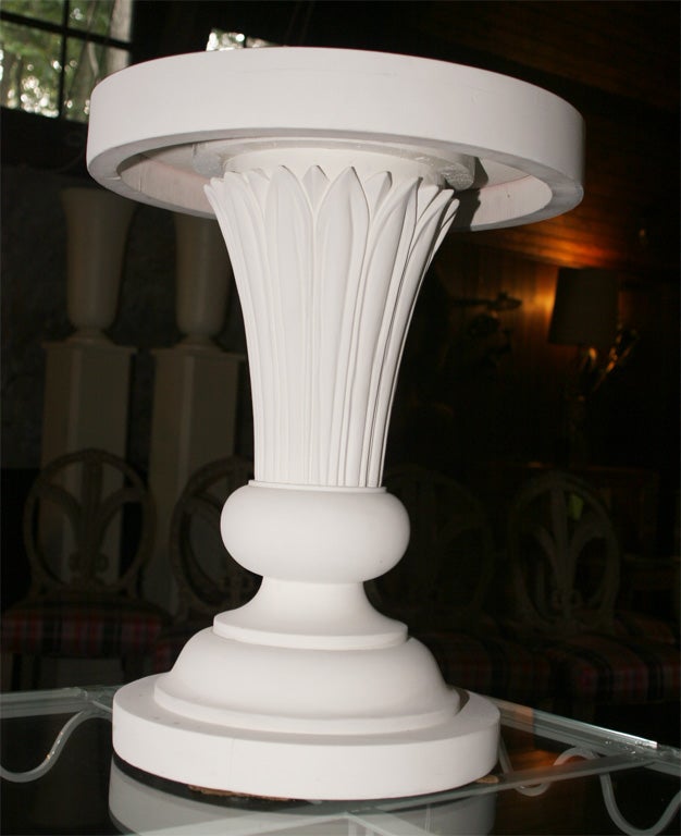 Small round foliate pedestal tables designed by Dorothy Draper and custom made for the public spaces of the Greenbrier Resort.