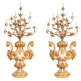 A Pair of Venetian Painted, Parcel Gilt and Tole Candelabra