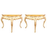 A Pair of Serpentine White Painted and Parcel Gilt Consoles