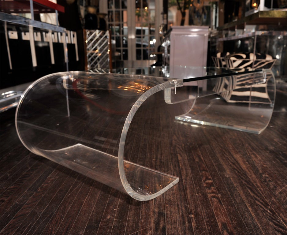 Late 20th Century CURVED LUCITE COFFEE TABLE WITH A GLASS TOP