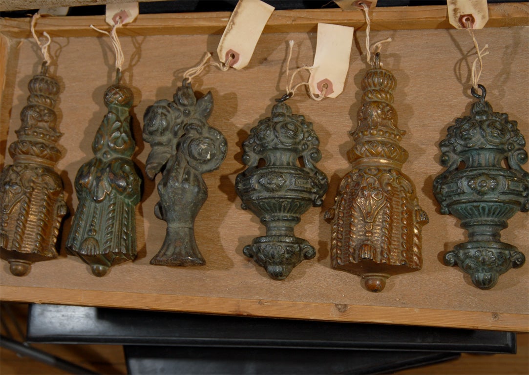 Various assorted antique cast-iron drapery weights.  Priced individually. Would make great paperweights. Would make great book weights.