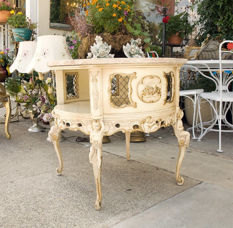 Ornate Rococo Revival, side table with original pink marble...<br />
gilded,cherubs,flowers,yummi.....