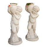 PAIR OF CHERUB BOY STATUES