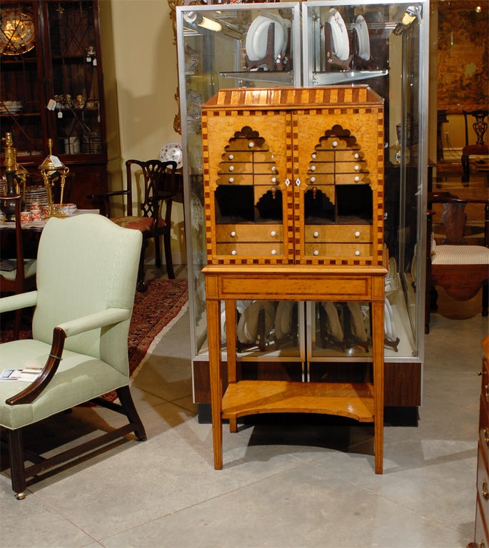 A  George III Burr Maple and Rosewood Collectors Cabinet