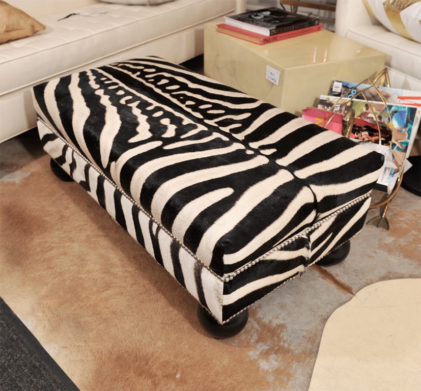 Decorative zebra ottoman. We also custom make other sizes and shapes. Production time 12 weeks. Factory is located in NJ.
Zebra hides are from South Africa.
This ottoman is sold. We will make you a new one. Production time is 12 weeks.
Measures: