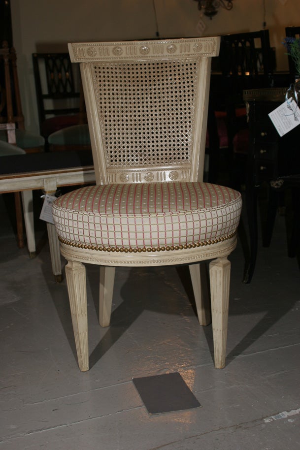 Fantastic set of four white washed cane Back Jansen chairs with Louis XV legs.
  