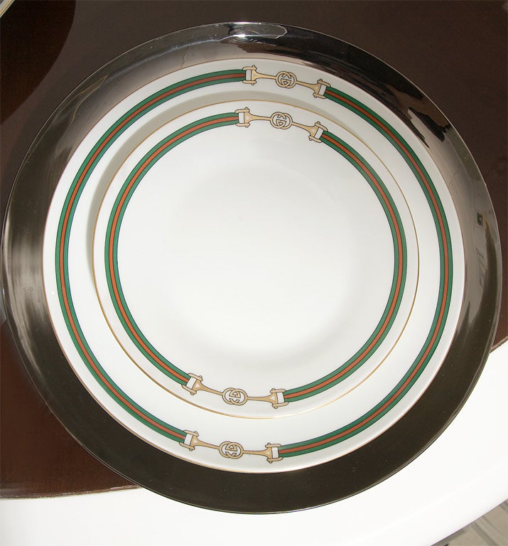 Wonderful collection of Richard Ginori for Gucci china.  The china is in excellent original condition- no chips or cracks.<br />
<br />
The collection of china is made up of 14 dinner plates and 16 salad plates, with 3 serving pieces:  an oval
