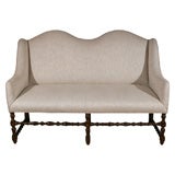 Double Camel Back Linen Upholstered Sofa on Turned Frame