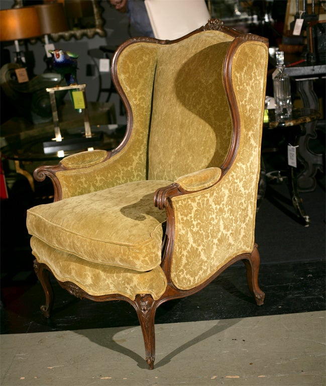 Wood French carved wood wing chair