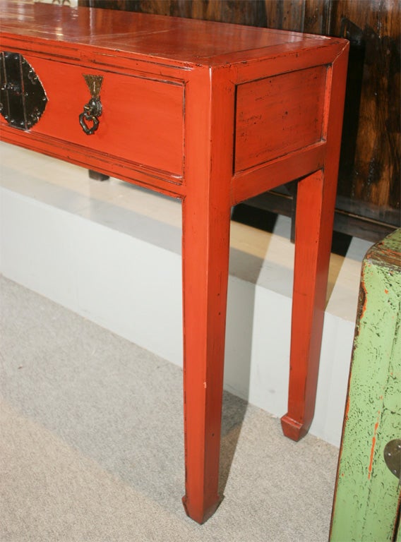EARLY 20TH CENTURY CHINESE 19TH CENTURY CONSOLE TABLE WITH DRAWERS RE-LACQUERED IN RED, NAM WOOD FUJIAN PROVENCE
