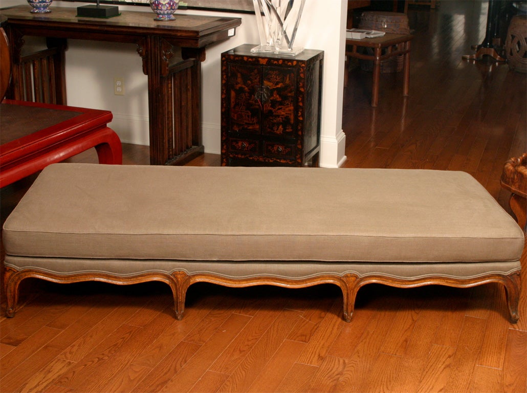 Large French ottoman. Newly covered in brown heavy linen.